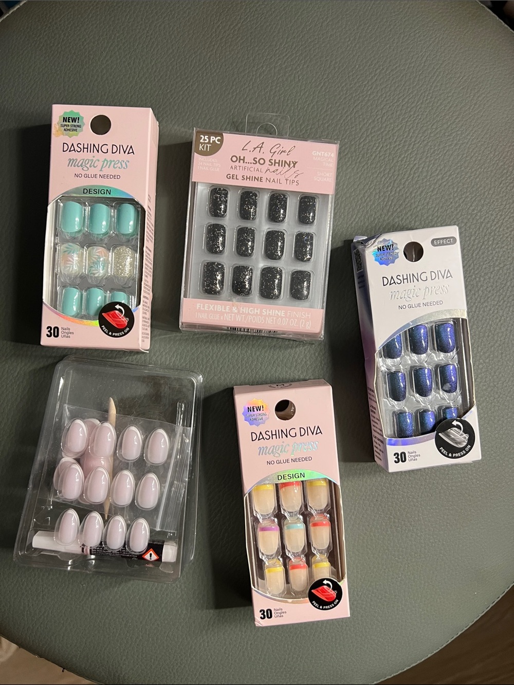 5 unopened sets of press on nails.